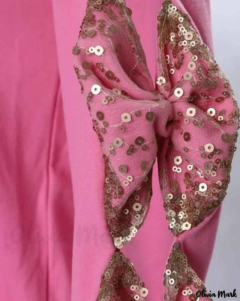 Xieyinshe - Ribbed Long Sleeve Top with Contrast Sequin Bow Decor